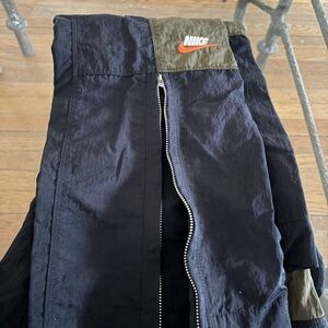 Nike Black and Olive Green Jacket with Orange Swoosh